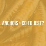 European anchovy fillets in olive oil, Mediterranean style, close-up, fresh and flavorful, rustic wooden background, natural lighting, realistic.